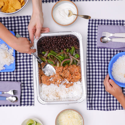 Chicken Tinga Burrito Bowl with tender chicken, succulent black beans, buttery rice, and fresh fajita veggies from Kitchenette, a Santa Barbara based family meal delivery service.